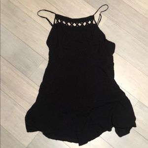 Black romper with cross detailing